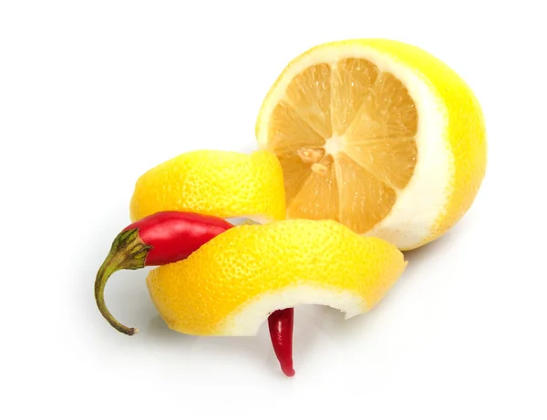 stock image half lemon with chili pepper