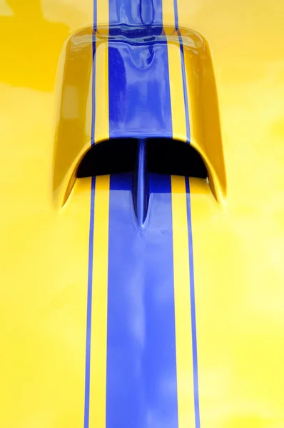 Top View Yellow Blue Car Detail — Stock Photo, Image