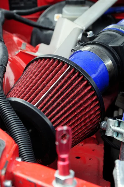 Car air filter zero resistance. element of a sports car tuning. photo toned. — Stock Photo, Image