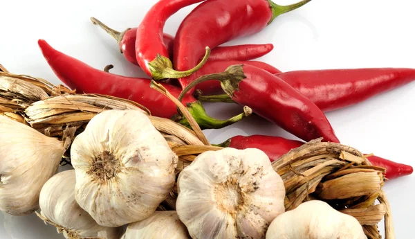 Garlic and red chili peppers - hot spices — Stock Photo, Image