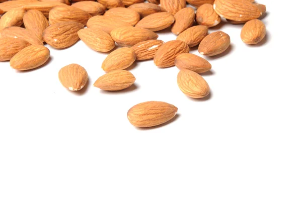 Almond nuts on white — Stock Photo, Image