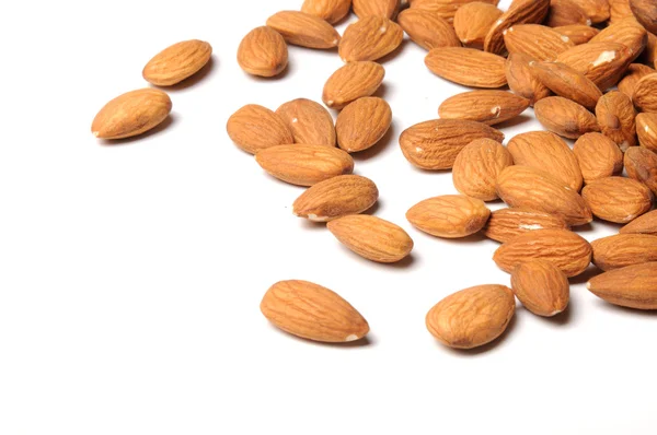 Almond nuts on white — Stock Photo, Image