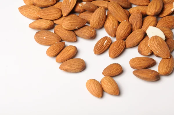 Almond on white — Stock Photo, Image