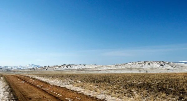 Blauer Himmel über der weiten Steppe, der Insel Olchon, dem Baikal. verwendete Tonung des Fotos — Stockfoto