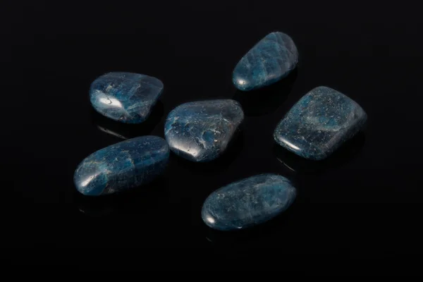 Apatite gemstone on black — Stock Photo, Image