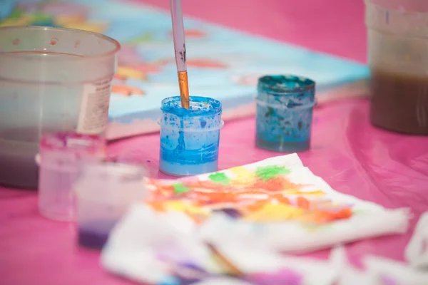 Watercolor paint on the table — Stock Photo, Image