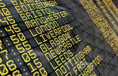 Airport Departure Board with United Kingdom destinations clipart