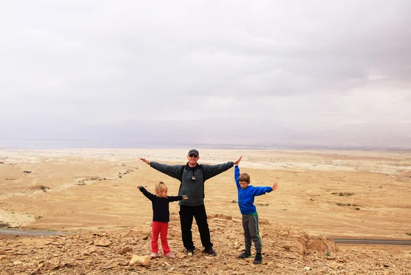 Father hiking with  kids in the desert — Stock Photo, Image