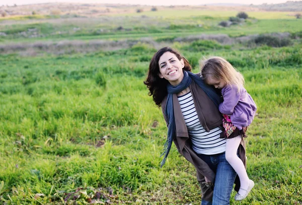 Beautiful mother and daughter — Stock Photo, Image