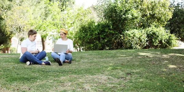 Two Happy Women Sitting Park Working — Stock Photo, Image