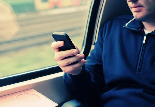 Man's hands using cellphone — Stock Photo, Image