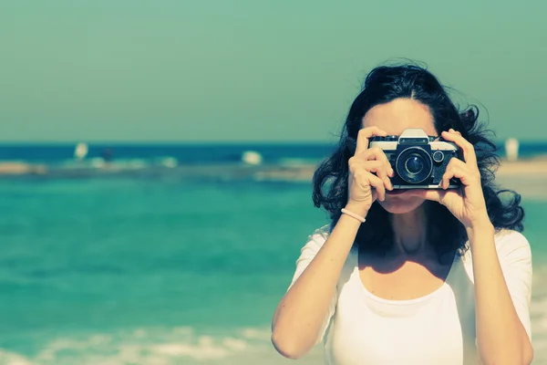 Woman with vintage retro camera — Stock Photo, Image