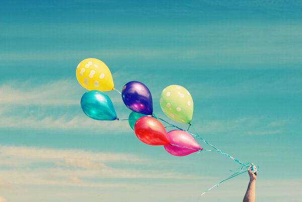 Colorful balloons in blue sky