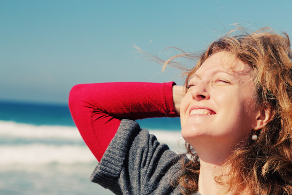 Beautiful woman smiling on the beach