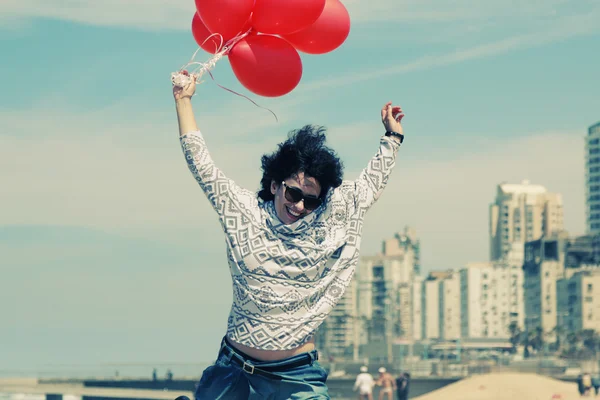 Femme avec des ballons — Photo