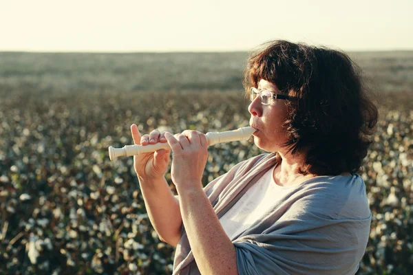 Beautiful woman with flute — Stock Photo, Image