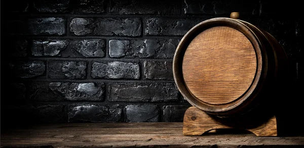 Wooden cask and bricks — Stock Photo, Image