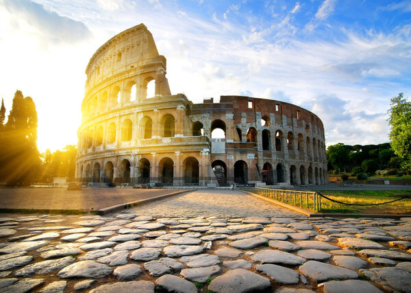 Ancient Colosseum in Rome at dawn, Italy