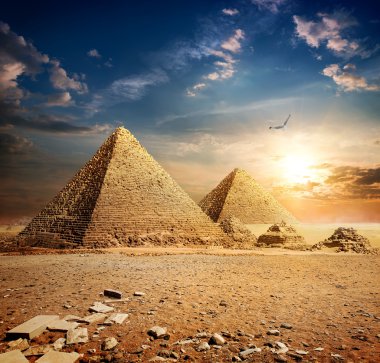 Sunset over pyramids clipart