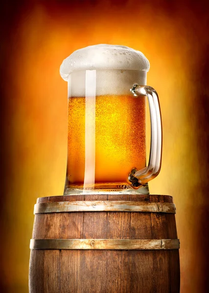 Beer with cask on yellow — Stock Photo, Image
