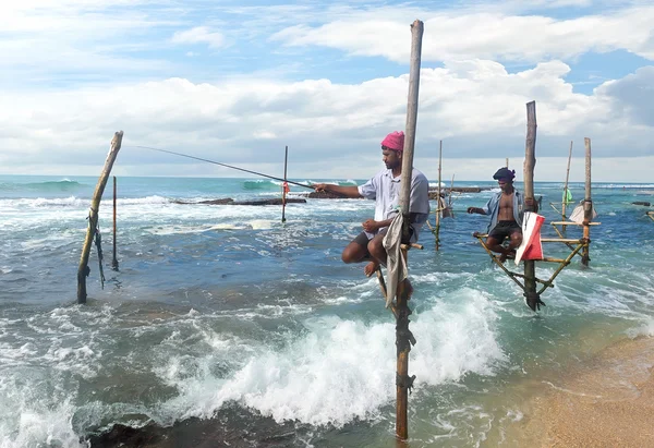 Fishermen on stick — Stock Photo, Image