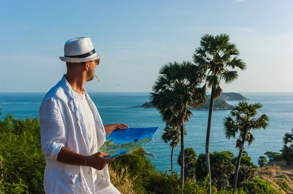 Man in white suit and hat — Stock Photo, Image