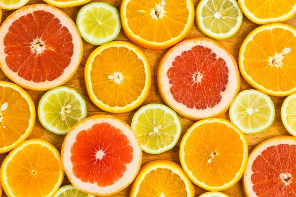 Plátky citrusových plodů pozadí — Stock fotografie