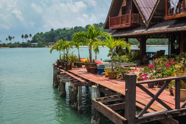 Houses on stilts in fishing village — Stock Photo, Image