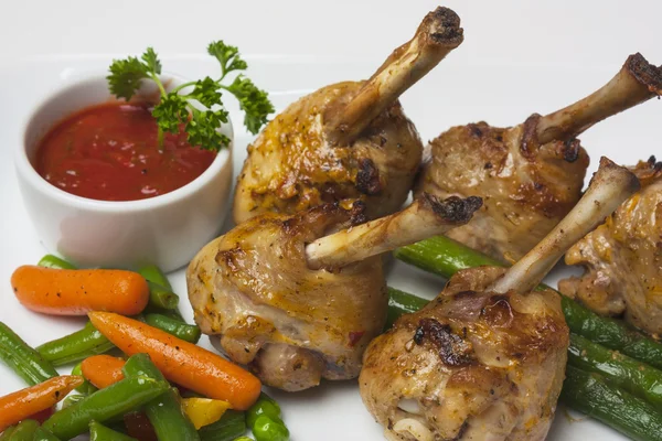 Chicken legs with asparagus — Stock Photo, Image