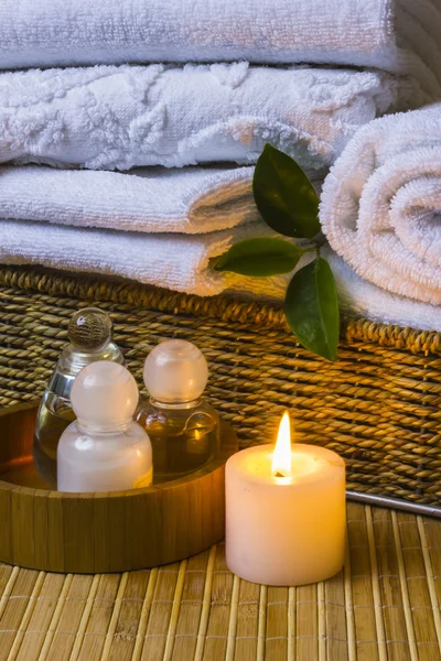 Spa with towels and candle — Stock Photo, Image