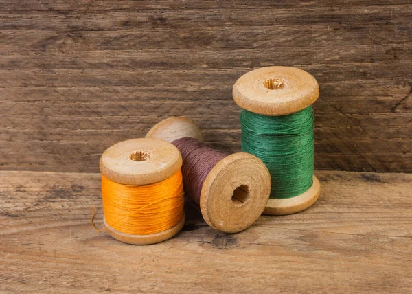 Spools Thread Background Old Wooden Planks — Stock Photo, Image