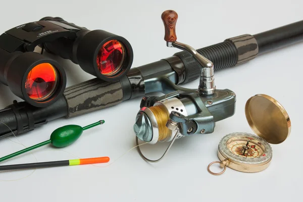 Fishing gear and compass — Stock Photo, Image