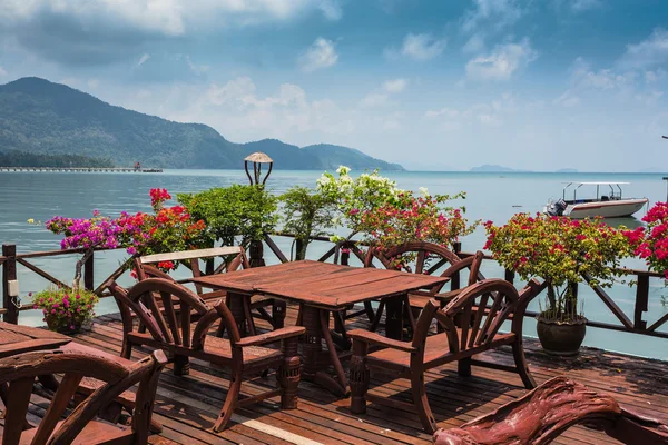 Cafe on veranda in the fishing village — Stock Photo, Image