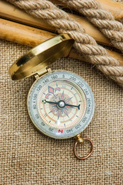 Close-up of compass with a rope — Stock Photo, Image