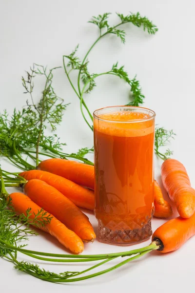 Carrots and carrot juice — Stock Photo, Image