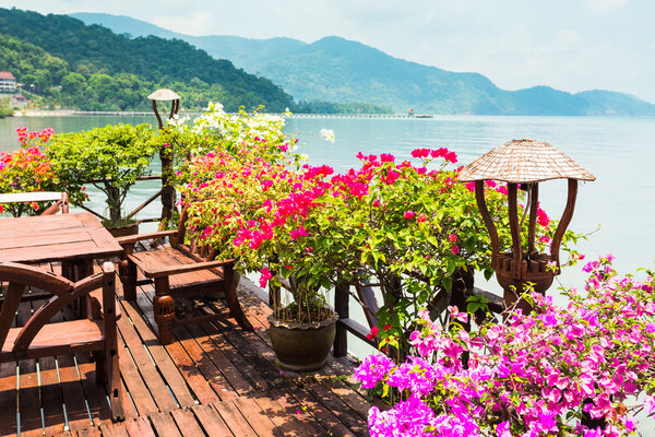 KOH CHANG, THAILAND - APRIL 3, 2015: Cafe on the veranda in the fishing village of Bang Bao tropical island of Koh Chang