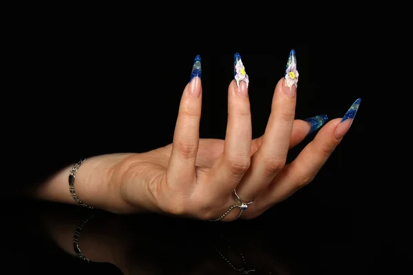 Beautiful hands with french manicure on black background — Stock Photo, Image