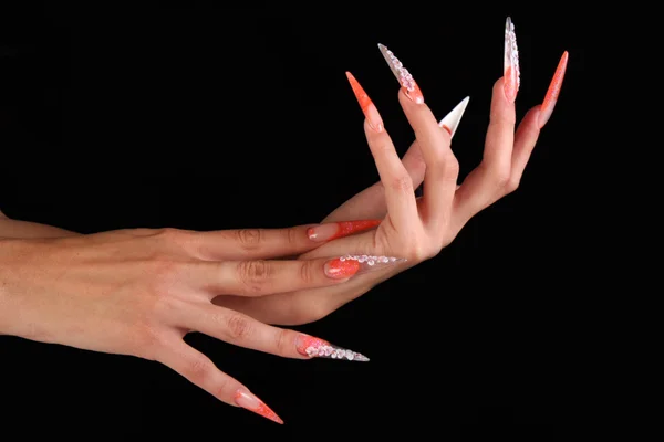 Beautiful hands with french manicure on black background — Stock Photo, Image