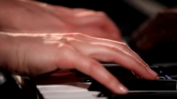 Two hands playing grand piano. — Stock Video