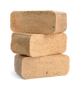 Biomass briquettes are a biofuel substitute to coal and charcoal clipart
