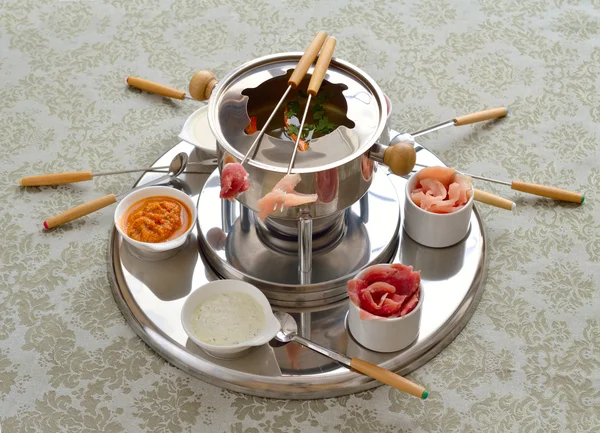 The Chinese fondue with broth — Stock Image The Chinese fondue with broth Stock Image
