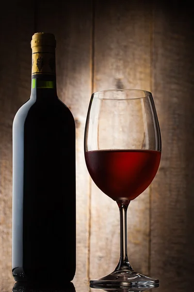 Bottle and gloss of wine — Stock Photo, Image