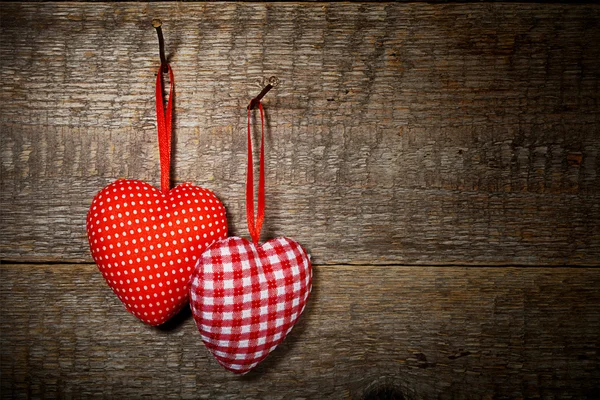 Checkered and polka dots two textile hearts — Stock Photo, Image