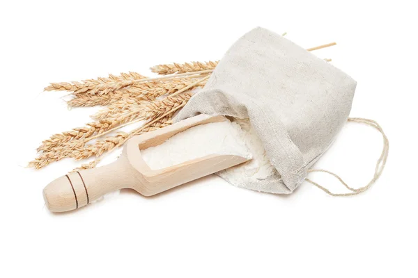 Wheat in bag and scoop — Stock Photo, Image