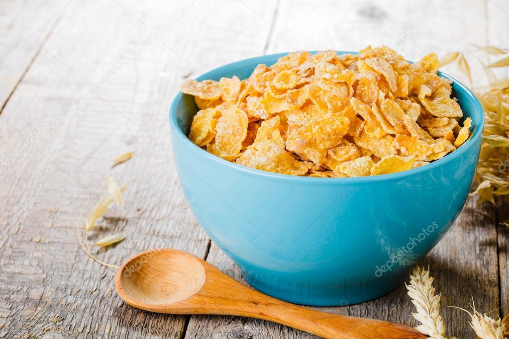 cornflakes on wooden table