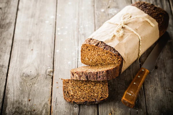 Bread wrapped in paper — Stock Photo, Image