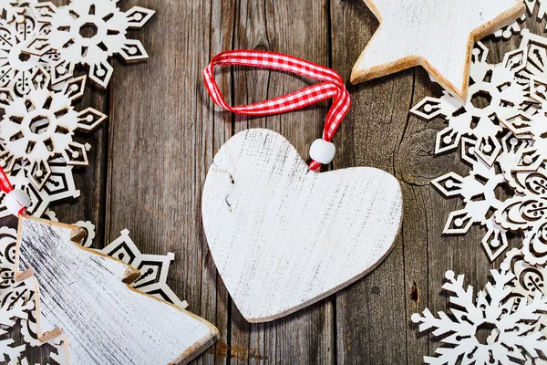 White wooden heart inside of frame — Stock Photo, Image