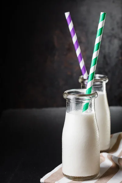 Two bottles with milk — Stock Photo, Image