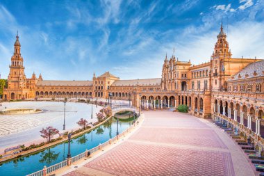 Spain, Seville. Spain Square, a landmark example of the Renaissance Revival style in Spanish architecture clipart