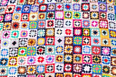 Çok renkli yün battaniye, geometrik arkaplan, retro dekoratif desen